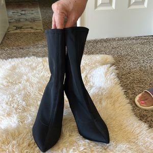 I am selling these fashion nova black boot heels, size 7,